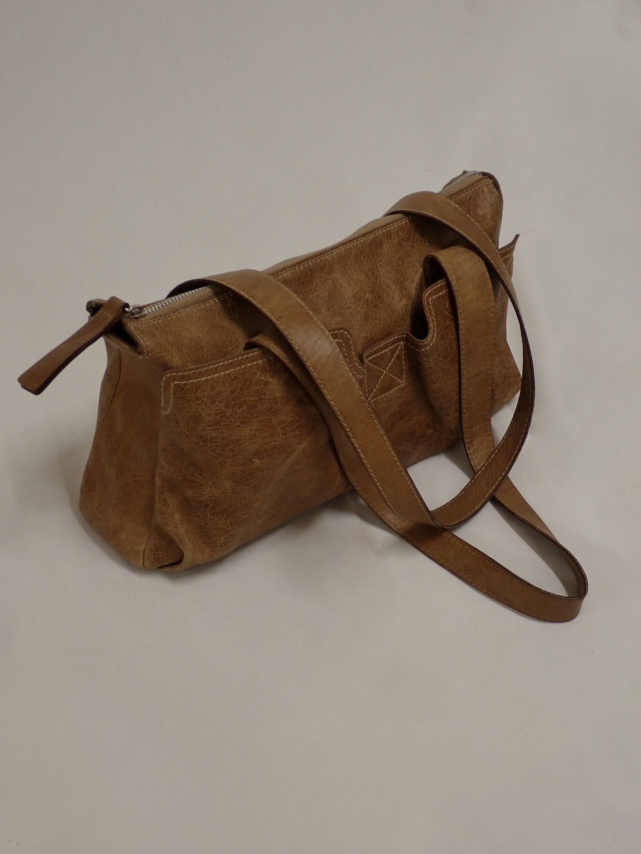 Aged leather bag