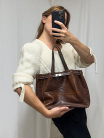 Aged leather bag