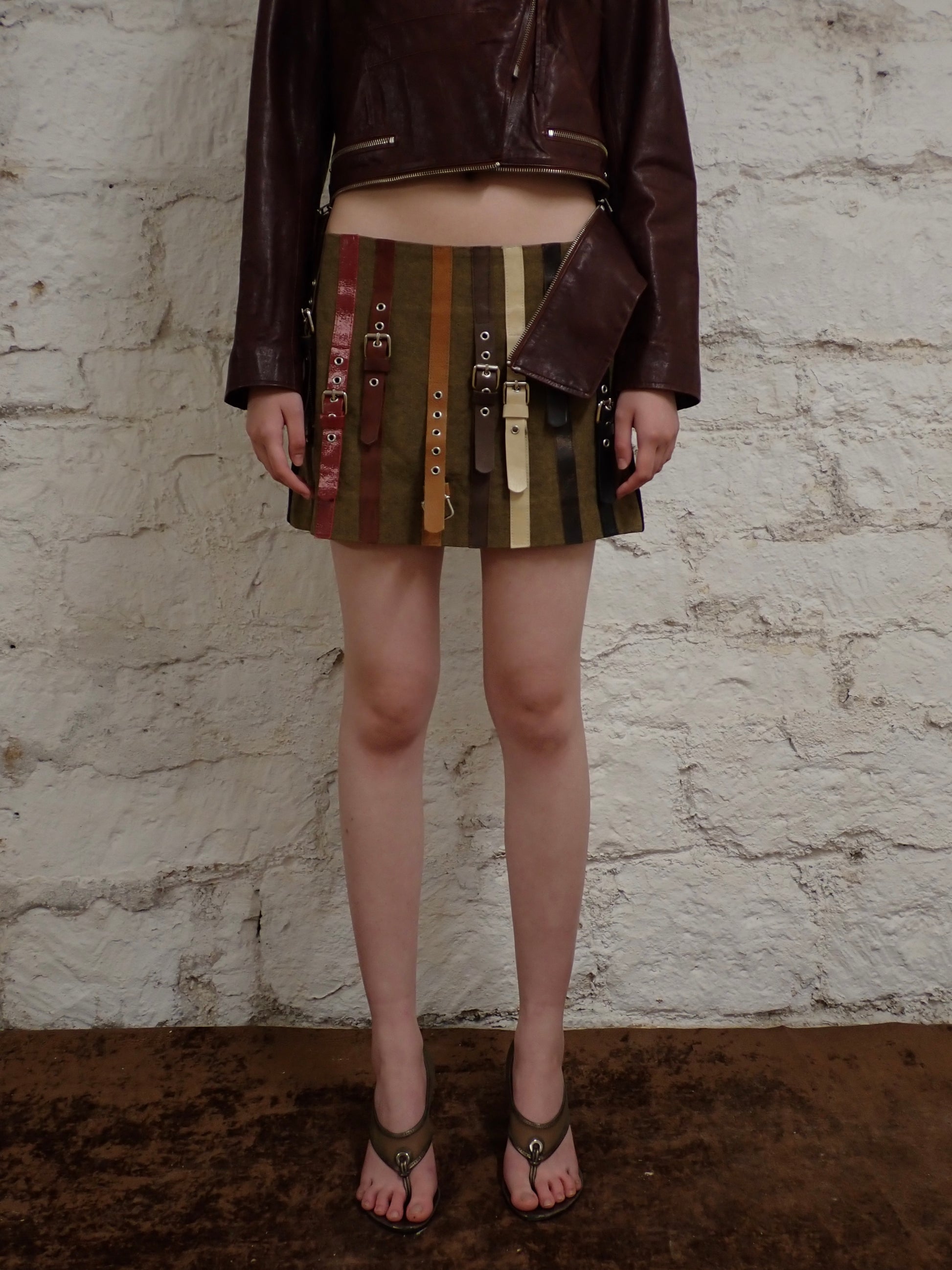 Multi belted mini skirt