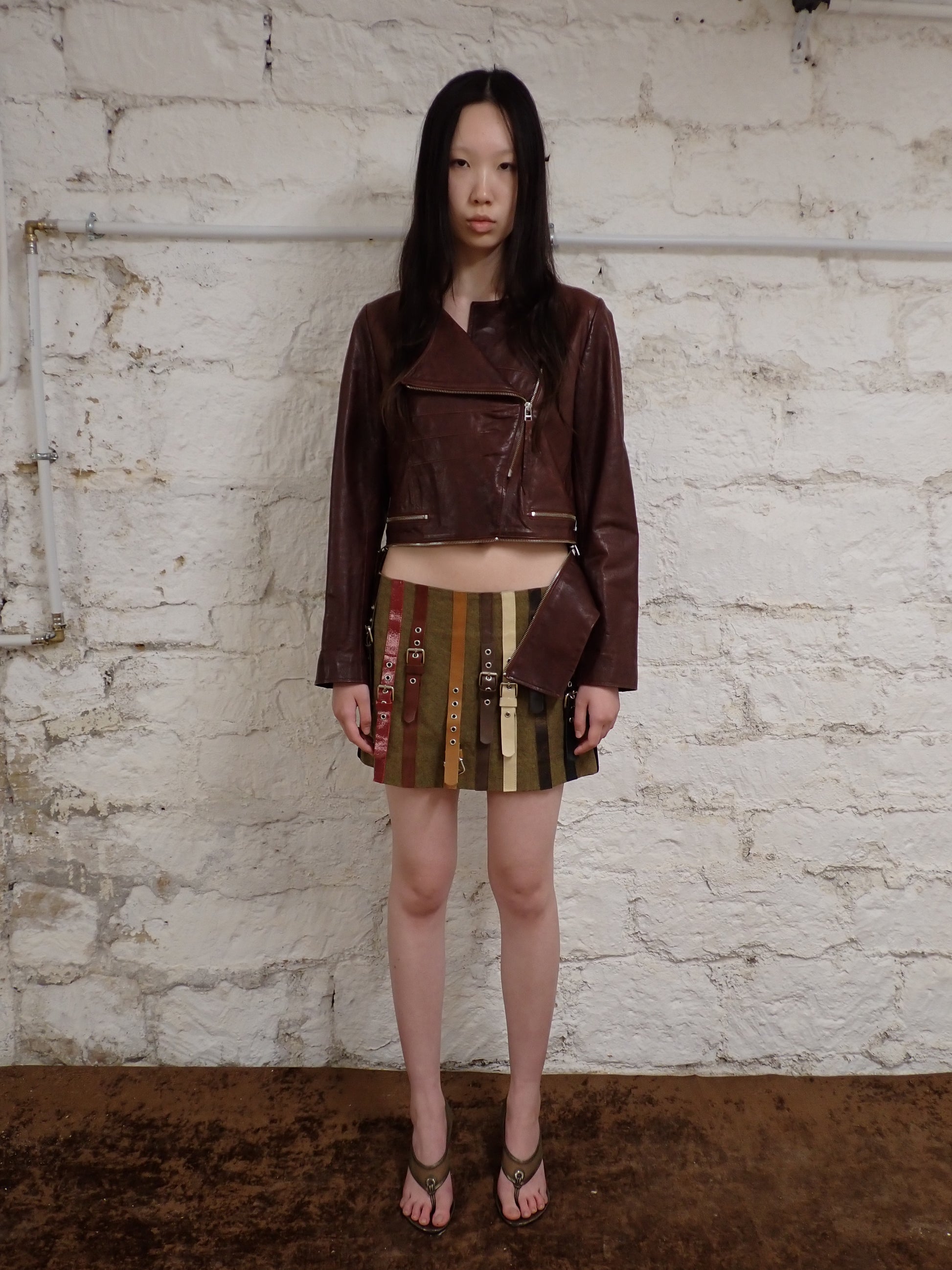 Multi belted mini skirt