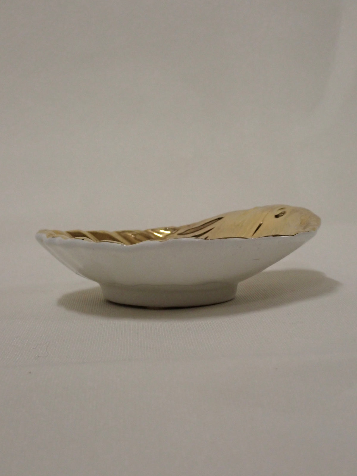 Golden shell ashtray