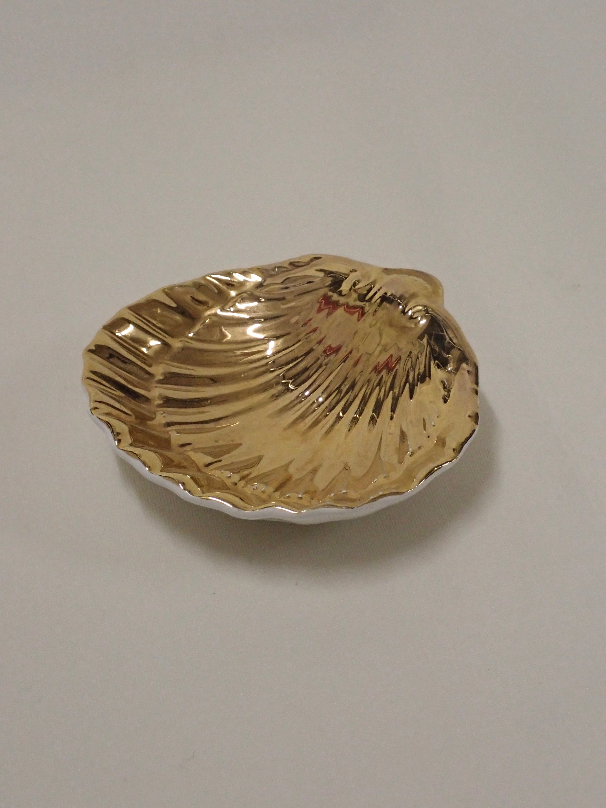 Golden shell ashtray