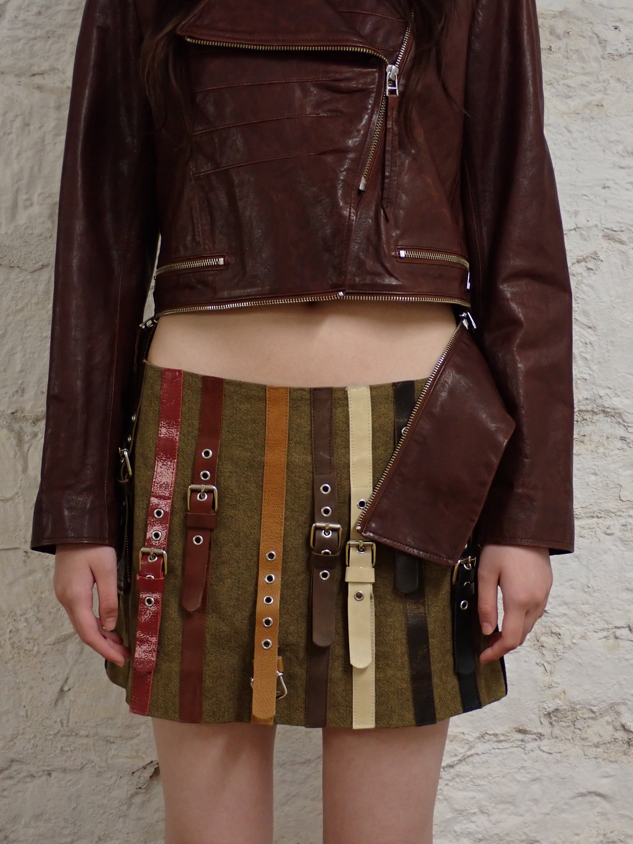 Multi belted mini skirt
