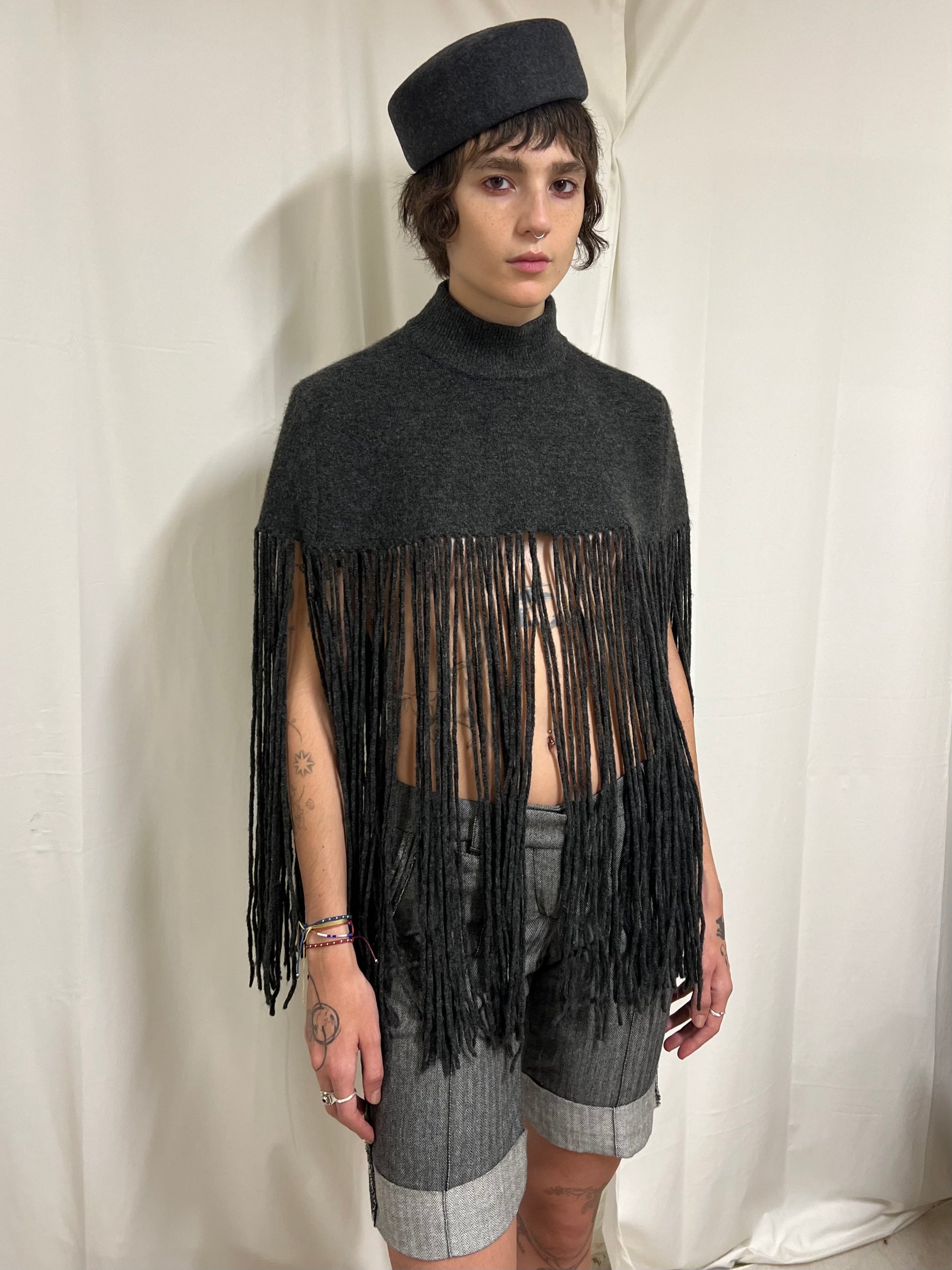 Grey fringed poncho