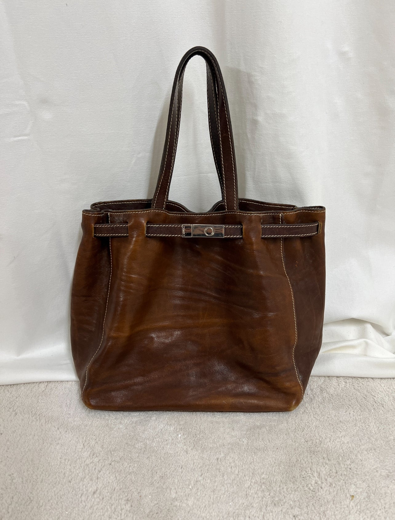 Aged leather bag